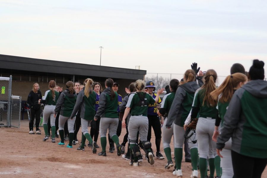 Varsity softball picks up two OK white wins in grand fashion on opening day