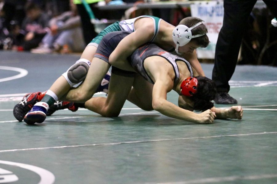 Varsity wrestling takes on Districts, Caden Jacobs advances to Regionals