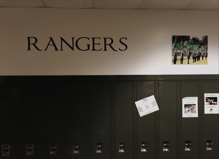 Ken George is giving positivity back to the school by selling hallway photographs