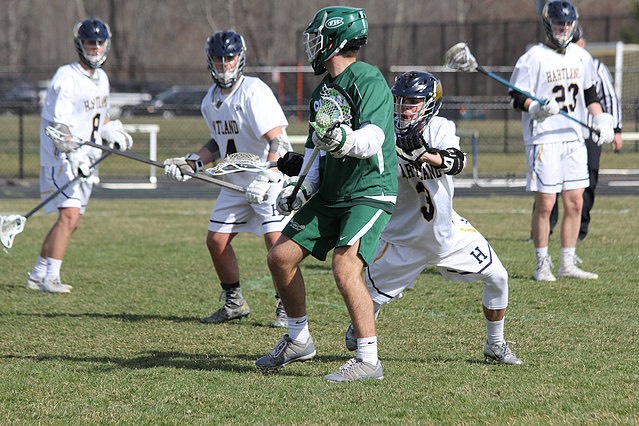 Boys varsity lacrosse defeats Hartland 17-15 in back-and-forth battle