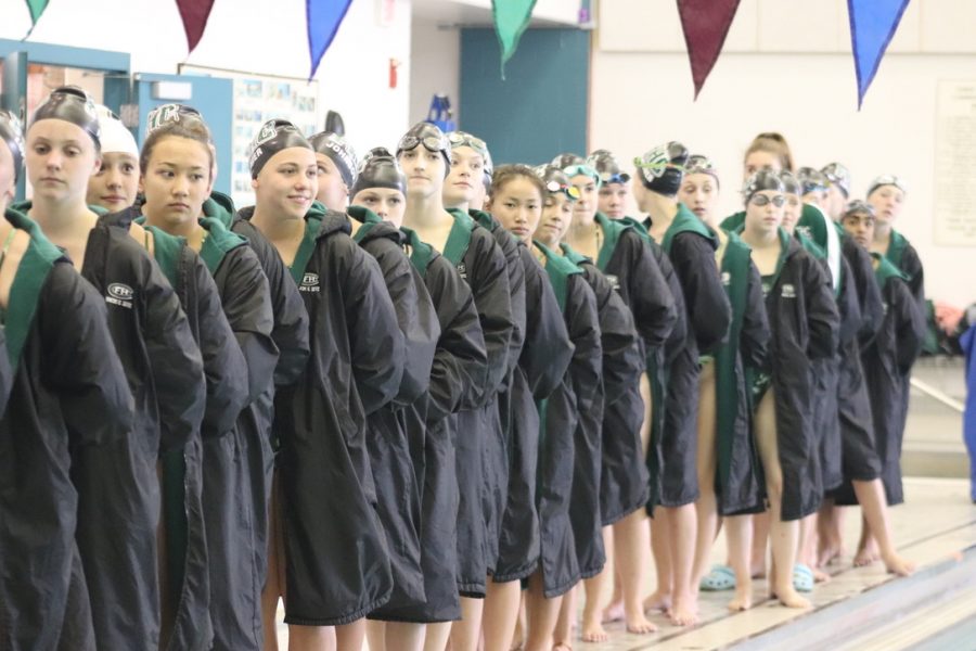Girls swim and dive wins top three divisions of Mustang Invitational