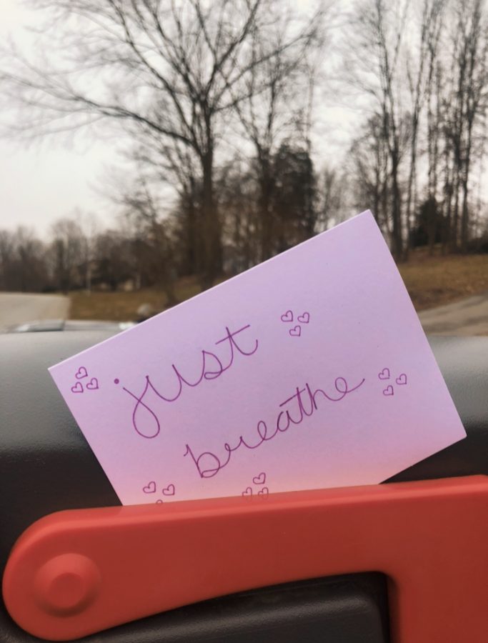 Leaving positive notes by neighborhood mailboxes is a small way to contribute happiness