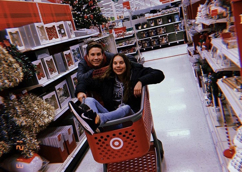 Ashley (in the cart) and her brother, Mason, inside a Target