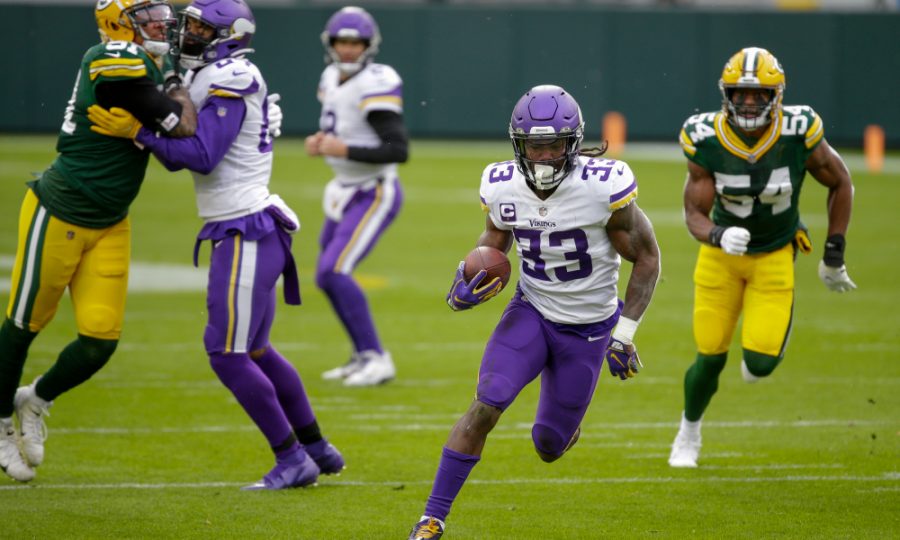 Minnesota Vikings Dalvin Cook runs for a touchdown during the first half of an NFL football game against the Green Bay Packers Sunday, Nov. 1, 2020, in Green Bay, Wis. (AP Photo/Mike Roemer)