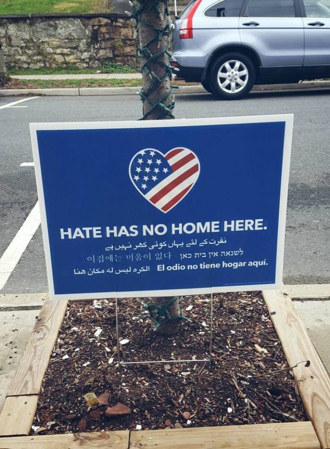 A photograph of a Hate has no home here sign in Clinton, New Jersey.