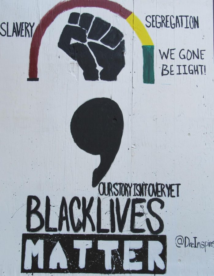 This is one of the paintings that resulted from the riots in downtown Grand Rapids by @dreinspires on Instagram