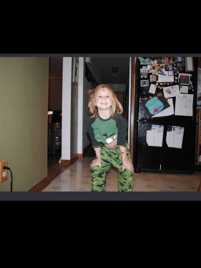 Me when I was younger in my dinosaur pajamas