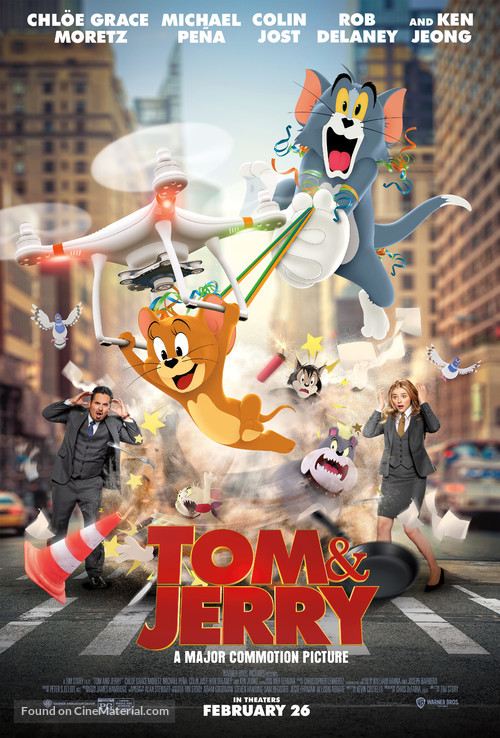 The movie poster of Tom and Jerry: The Movie featuring some of the cast 