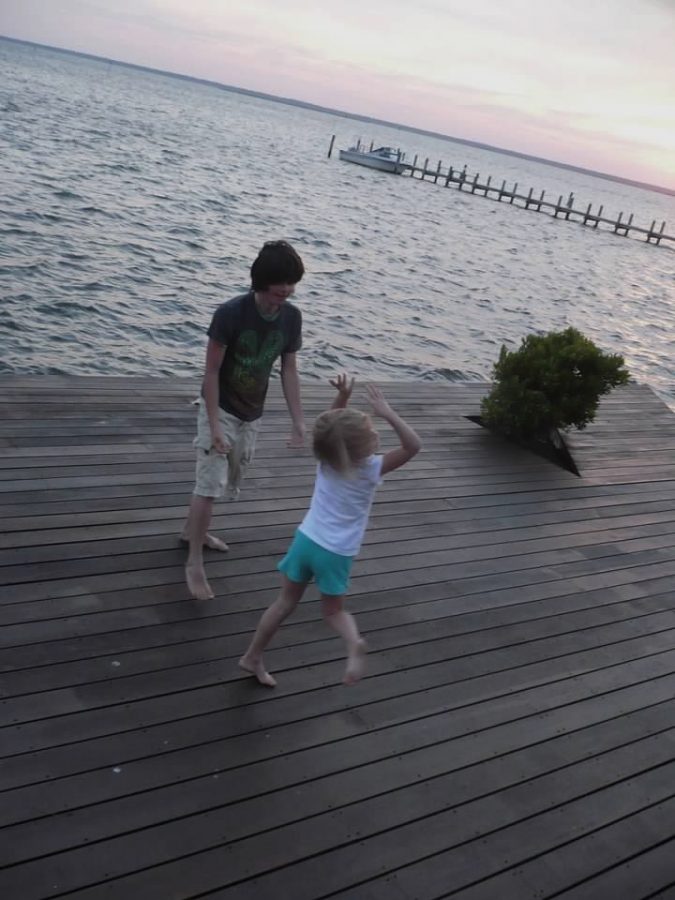 My brothers friend, Cam, and I dancing and singing outside my Nana Ingrid and PopPop Kirbys beach house. 