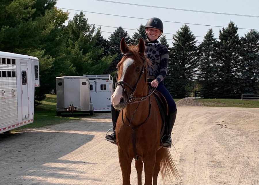 Katie Romijn on her horse, Malone. 