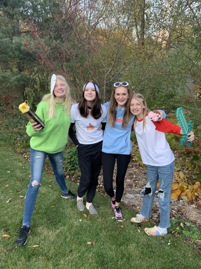 A picture of my friends and I trick-or-treating on the day of Halloween, which is a tradition that should not be changed.