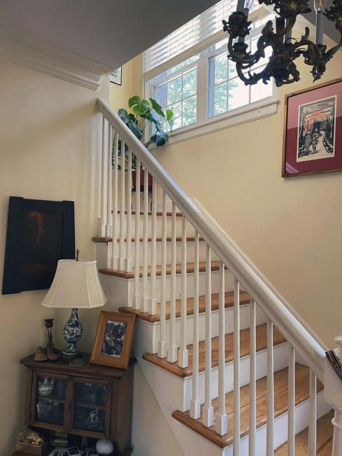 The stairway at my dads house cloaked in mid-day sunshine. 