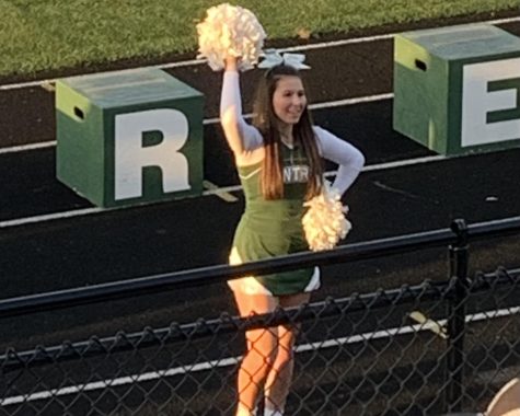 Junior Rylie Scobey spends her Friday nights during the football season on the track, while cheering on the team.