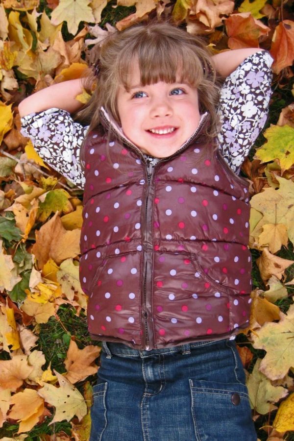 My kindergarten self indulging in one of her favorite activities: jumping into leaf piles