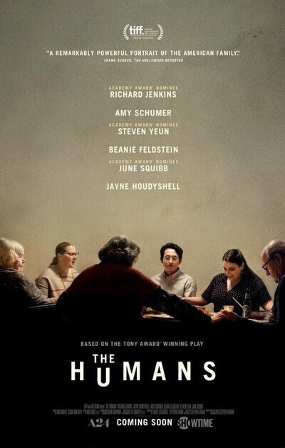 Pictured here is the entire family sitting at the dinner table in the poster for The Humans.