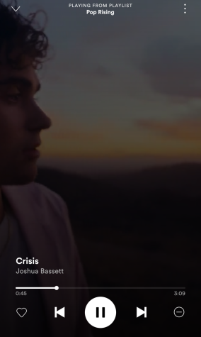 Snapshot of Bassetts music video for his new song Crisis