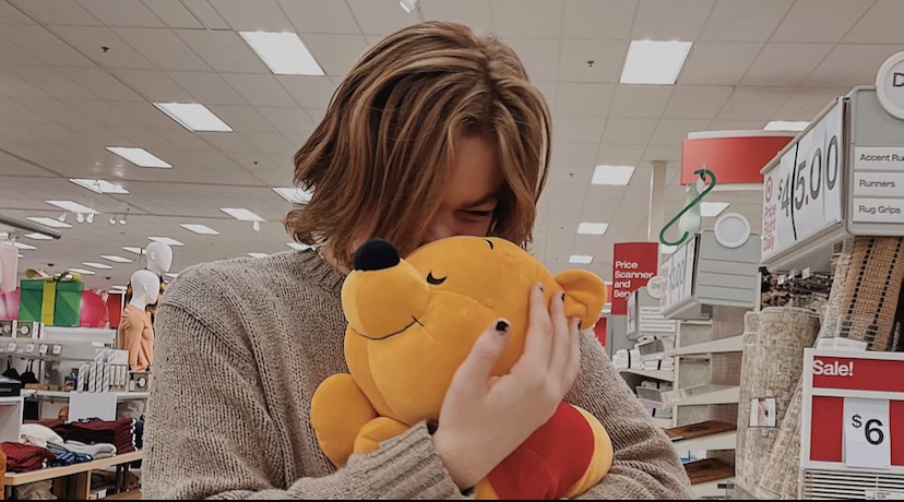 John Orr in Target holding a stuffed Winnie the Pooh
