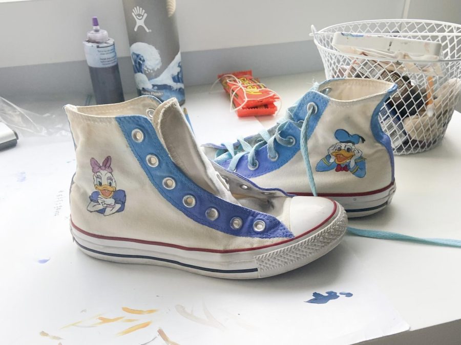 Jia Niemeyers favorite shoes that shes painted for herself, which are one of the two Disney pairs shes made.