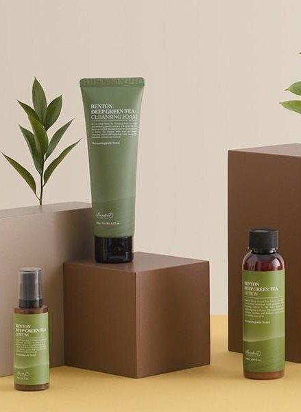 An aesthetic green and brown photo of a Korean skincare line.