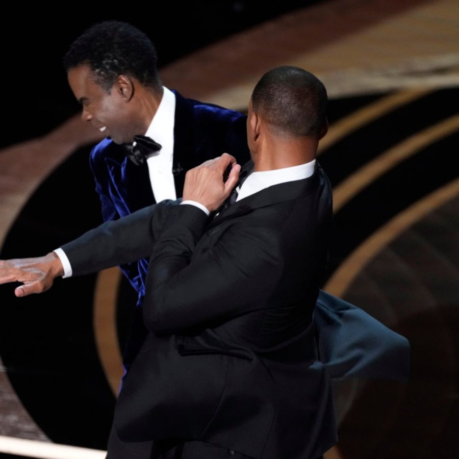 A photo captured right as Will Smith slapped Chris Rock at the 2022 Oscars.