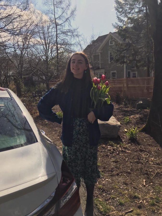 Me, standing in my Aunts backyard with a tulip in hand on Easter Sunday. I was feeling particularly like Jessie Lynn in this moment. 