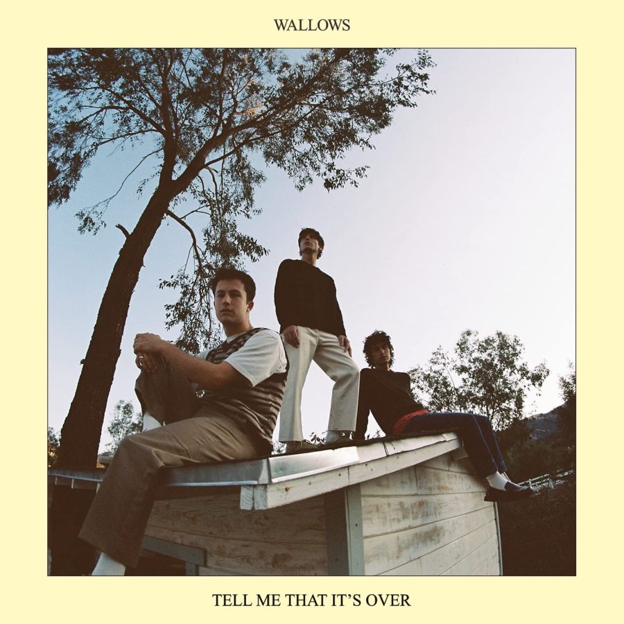 Dylan Minnette (left), Braeden Lemasters (middle), and Cole Preston (right) pose on a roof for the cover of Tell Me That Its Over.