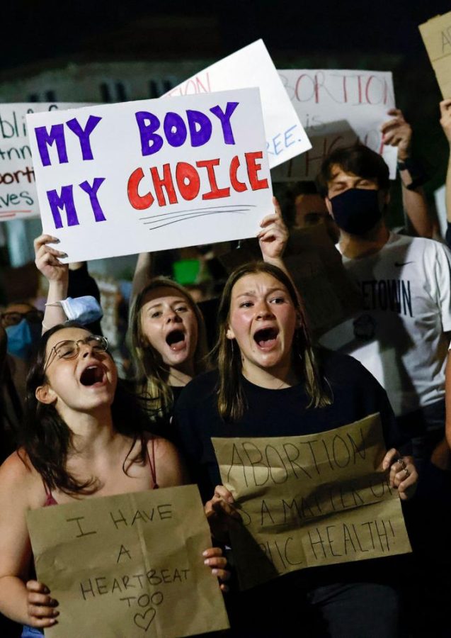 A+picture+from+protests+against+the+overturning+of+Roe+v.+Wade+which+would+most+likely+leave+the+decision+of+abortion+to+the+states.