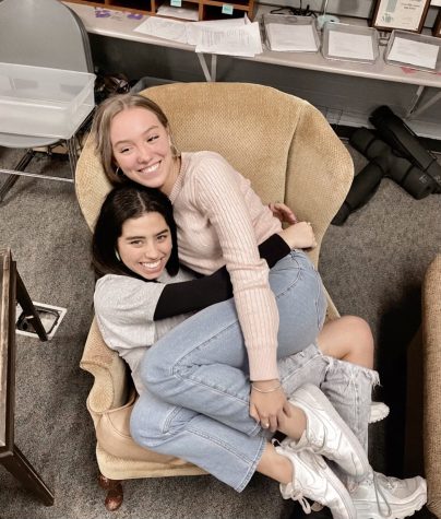 Allie and me on my favorite chair in November before our daily staff meeting began.