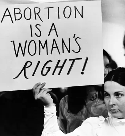An image taken at an abortion protest in 1971, before Roe v. Wade was ruled in favor of Roe.