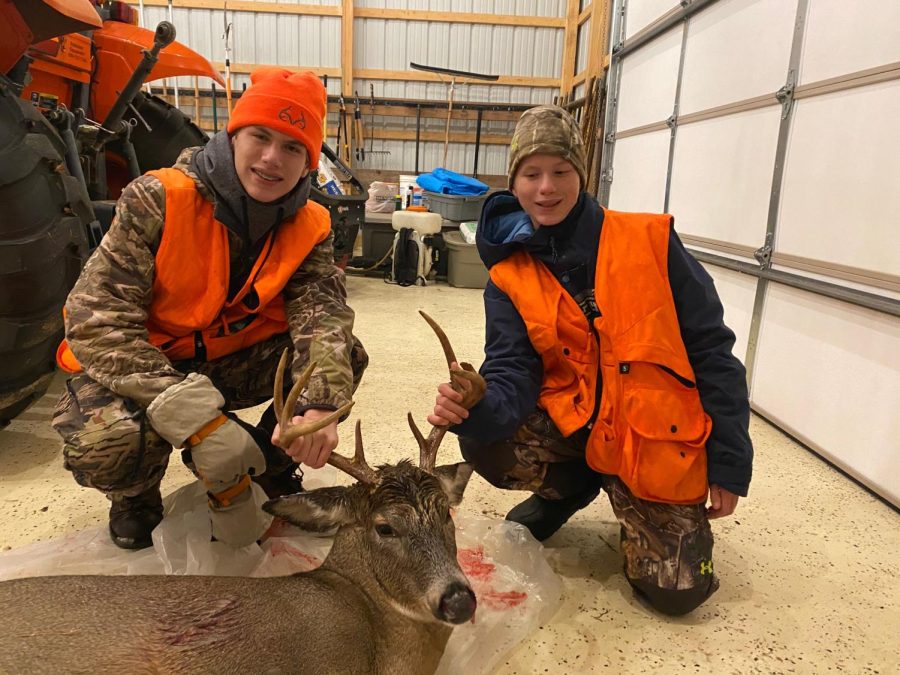 A Picture of Vaughn, his brother, and the buck they took down together