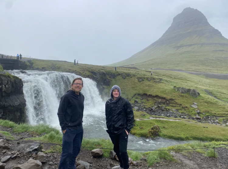 Nick+and+his+father+in+front+of+a+waterfall+in+Western+Iceland.