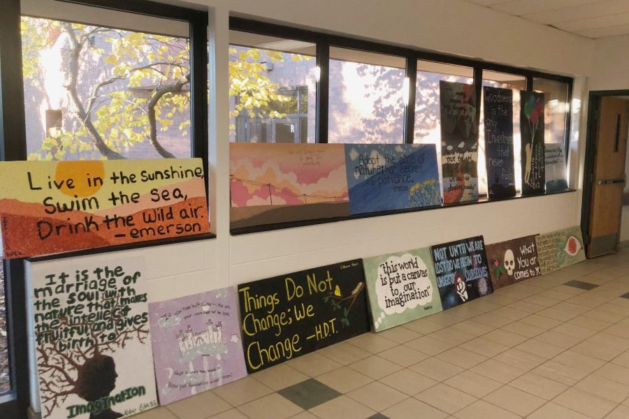Some of the ceiling tiles students painted for the transcendentalism project.