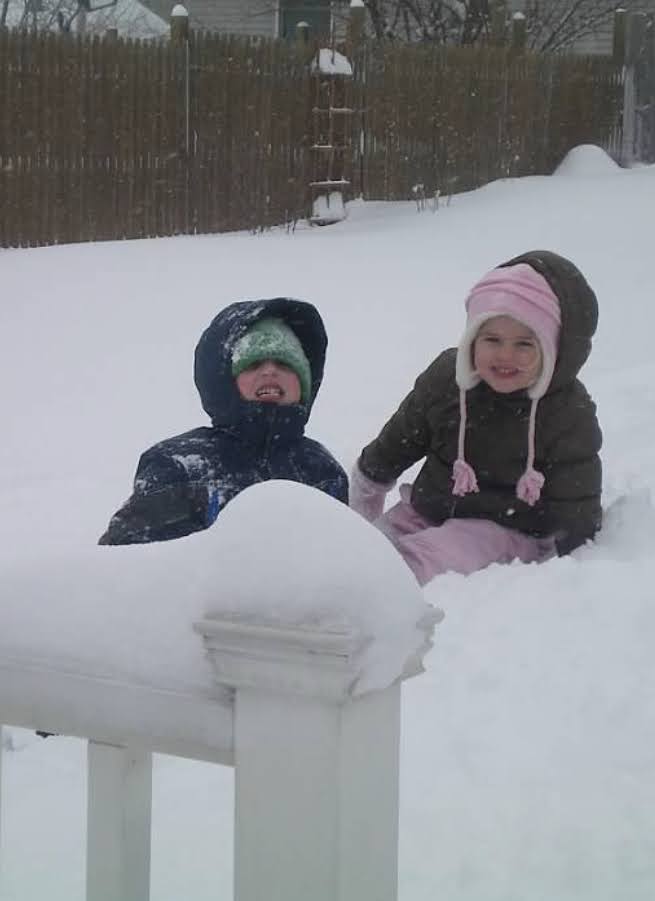 December 2008, my older brother and I playing in the  snow in Grand Haven.