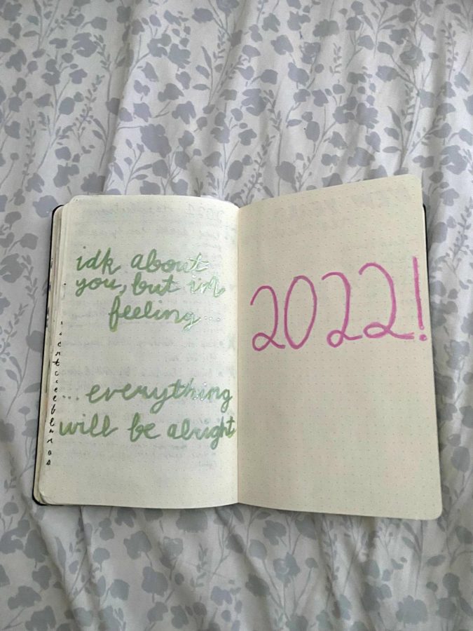 My New Years journal page from 2022, using lyrics from Taylor Swifts 22.