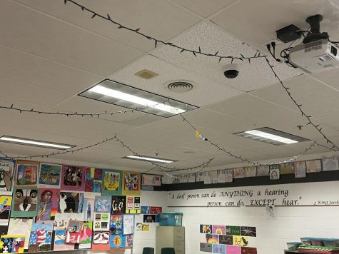 Mrs. Andersons classrooms walls are covered with personal bits of student interaction.