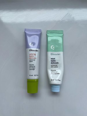 My new and old Glossier Balm Dotcoms, though i wish they were both the old style.