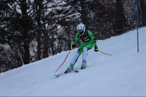 A photo of Karina doing one of her long standing enjoyments: skiing.