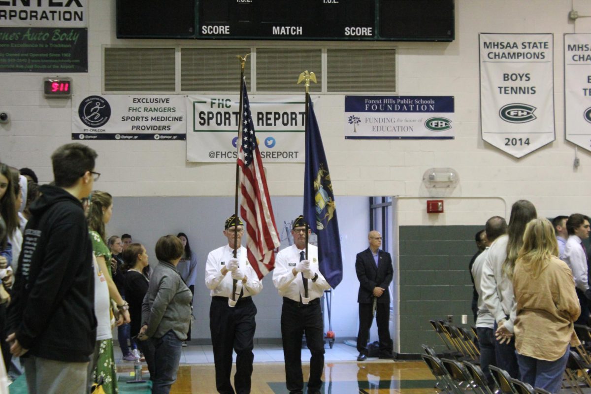 A+photo+from+the+Veterans+Day+Assembly+where+FHC+students+stand+to+honor+the+veterans+for+all+theyve+done