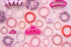 A picture of the Valentines Collection, with the claw clips, hair ties, and scrunchies 