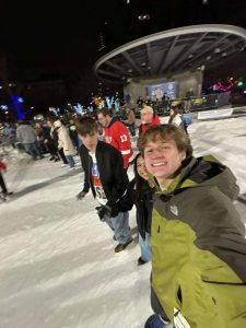 Logan skating at Rosa Parks Ice Circle with Ian and Kayla