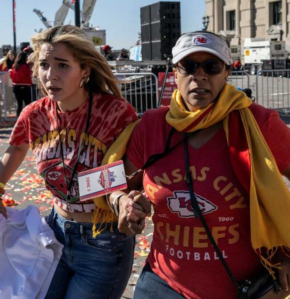 Chiefs fans flee the scene, the rally being ruined by violence.