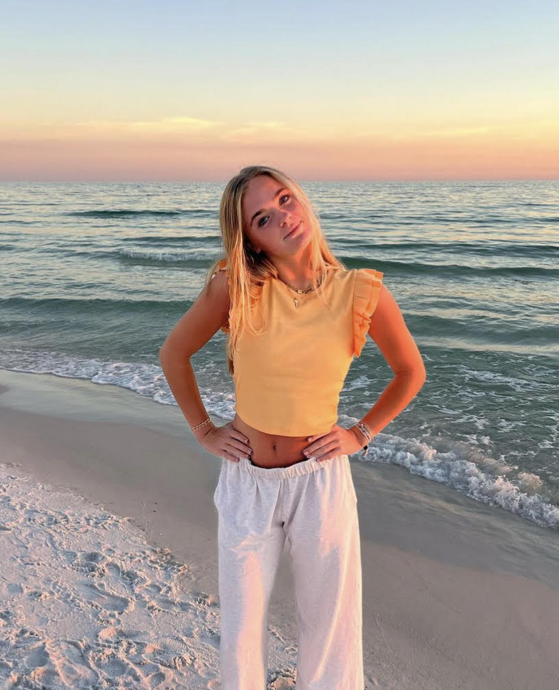 A picture of Abby during sunset on the beach 