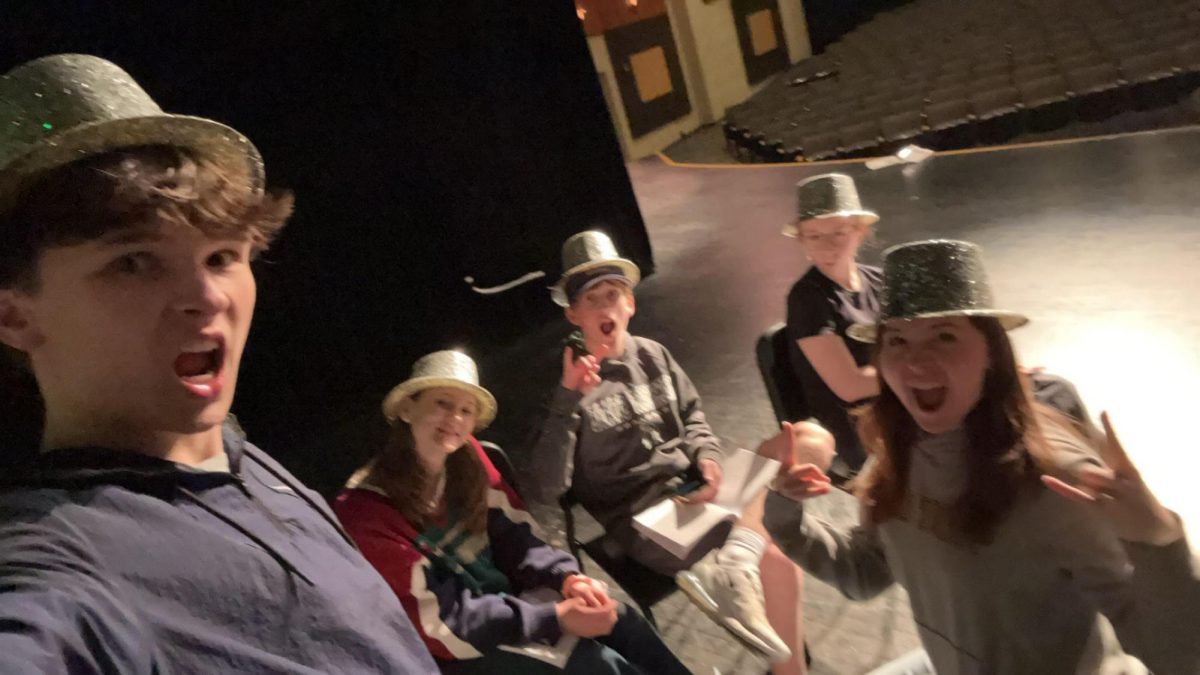 a photo from a rehearsal for the musical 