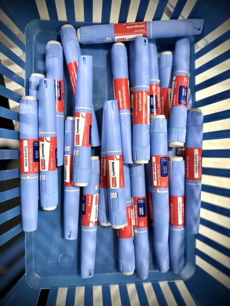 A photo of multiple Ozempic injection pens all inside one basket.