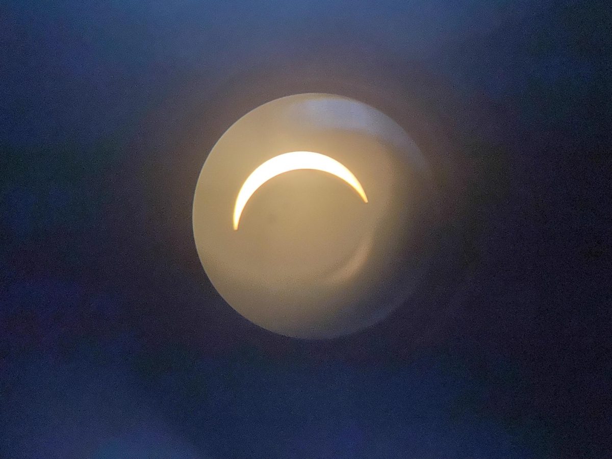 The+eclipse+through+a+telescope+on+the+day+I+wrote+this+column.