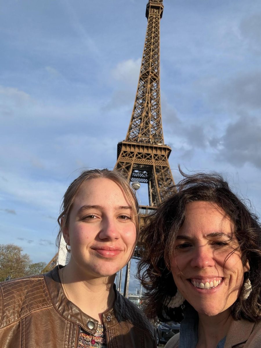 My mom and I in front of the Eiffel Tower over spring break where I tried out a capsule closet and mixed and matched every day.