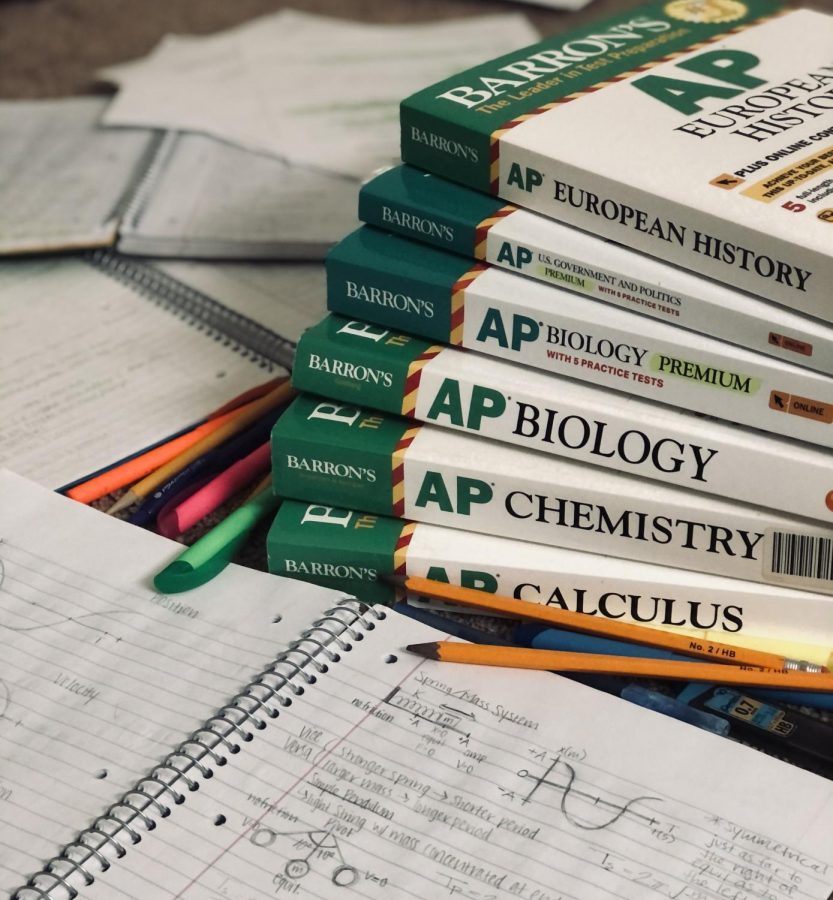 A collection of Barrons AP test prep books used by many students