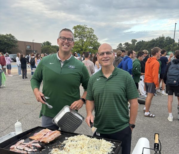 Haga and Assistant Principal John DeStefano at the Senior Cookout this fall. 