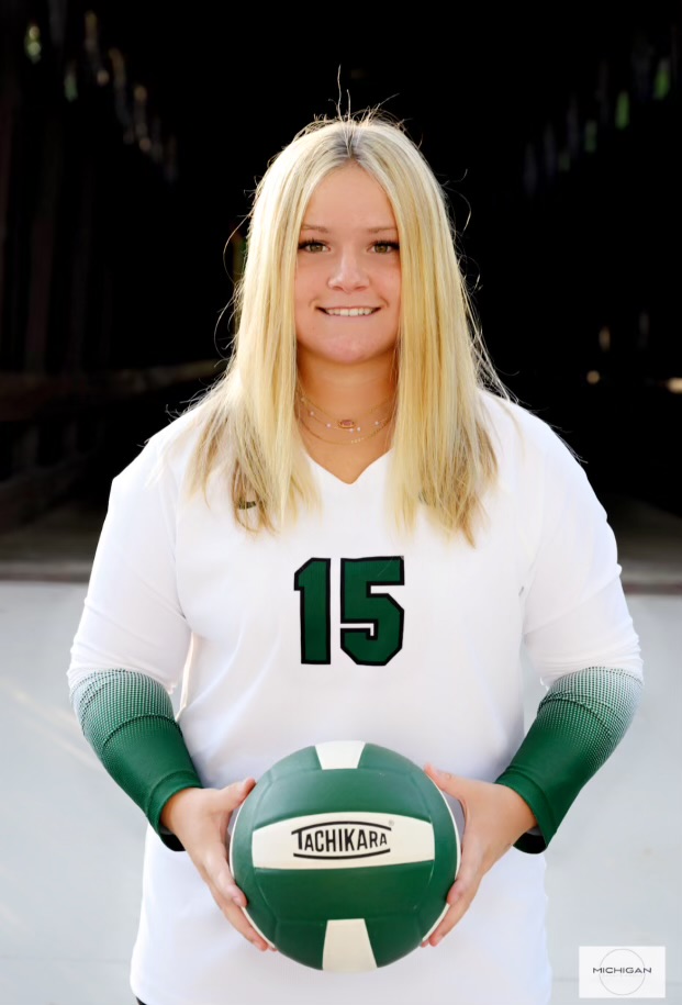 Kinzi was recently named one-of-three captains on the Varsity volleyball team, where she plays libero. 