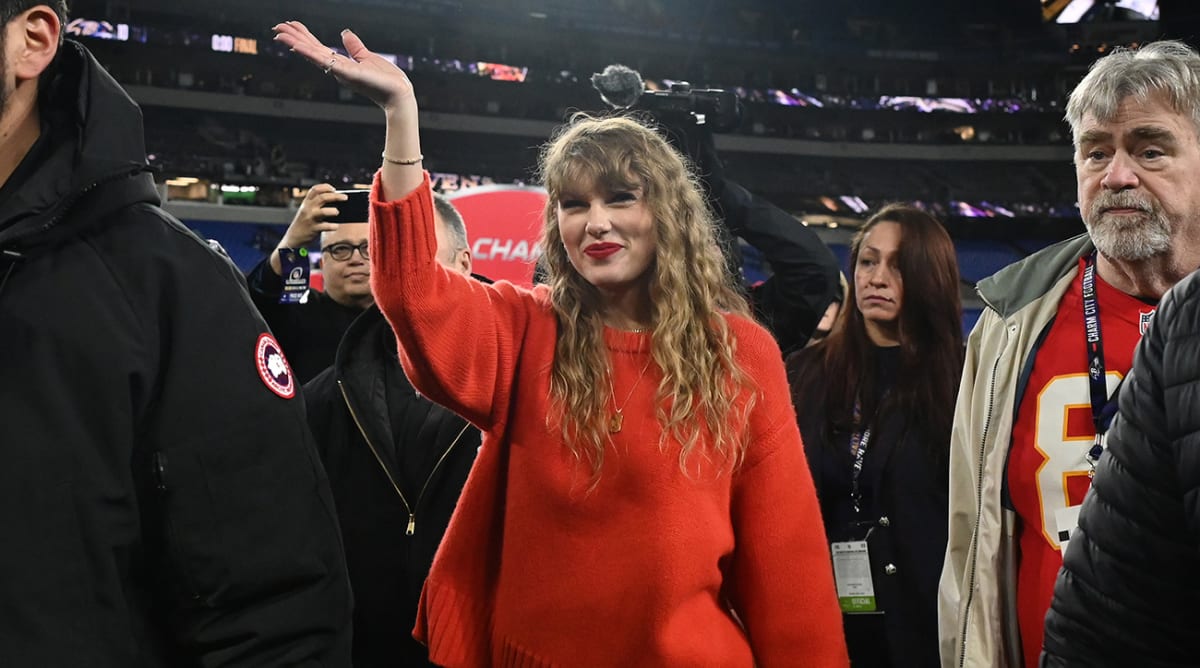 Taylor Swift at the Chiefs versus Baltimore game in her classic color. "Lucky red sweater."